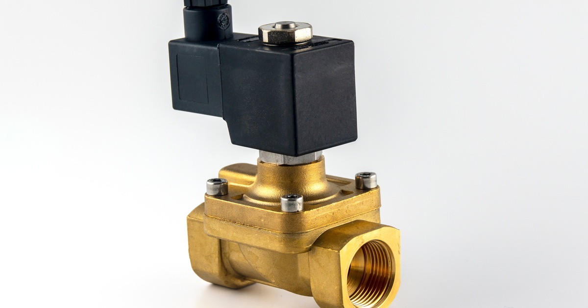 A brass solenoid valve with a black electrical coil mounted on top, shown against a plain white background.
